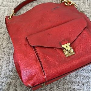 Worn LV bag in orange